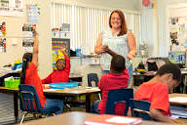 A Beacon teacher leads a classroom lesson