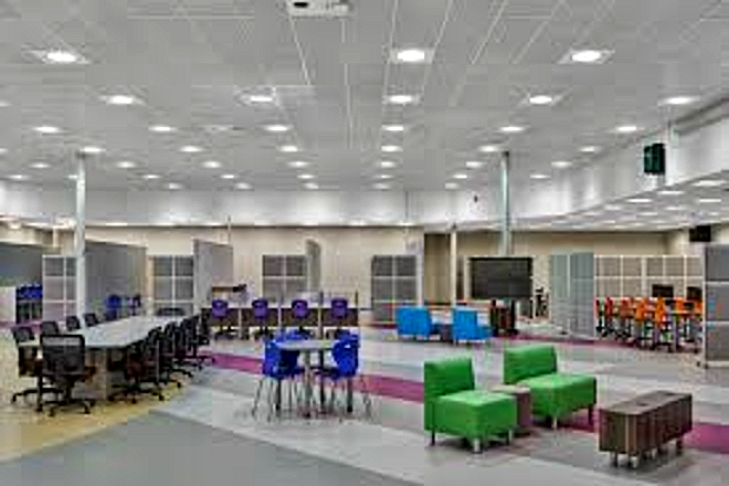 The CCI commons with meeting tables and soft seating