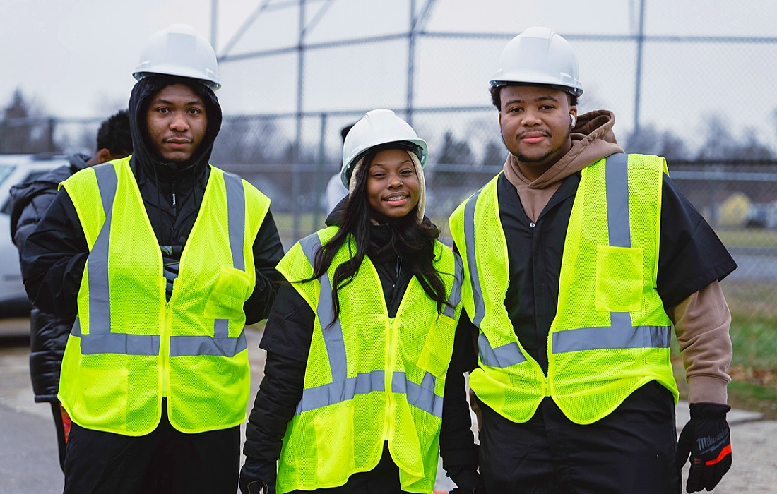 Harper Woods CTE students in safety gear on a construction site