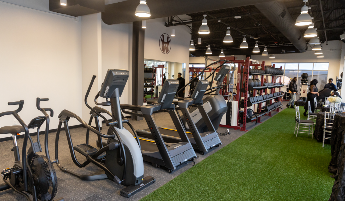 The Excellence Institute fitness floor with turf training lane