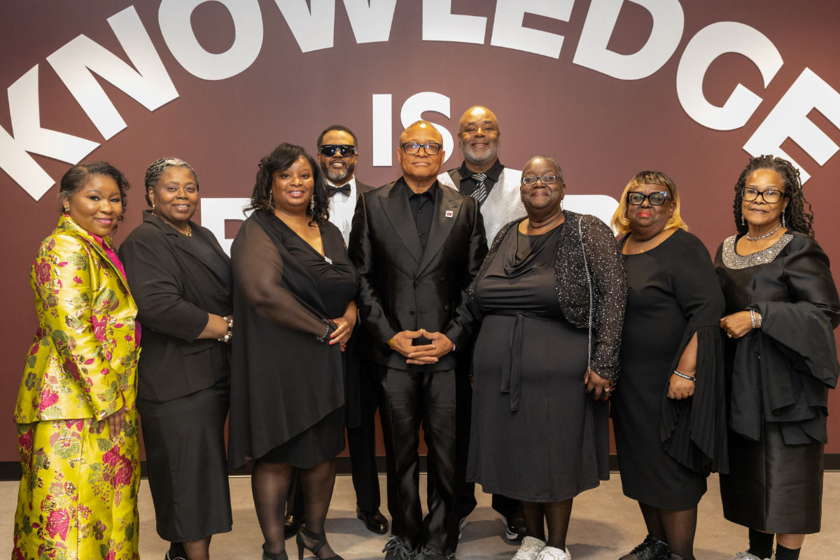 District leaders and community members at the Excellence Institute opening celebration