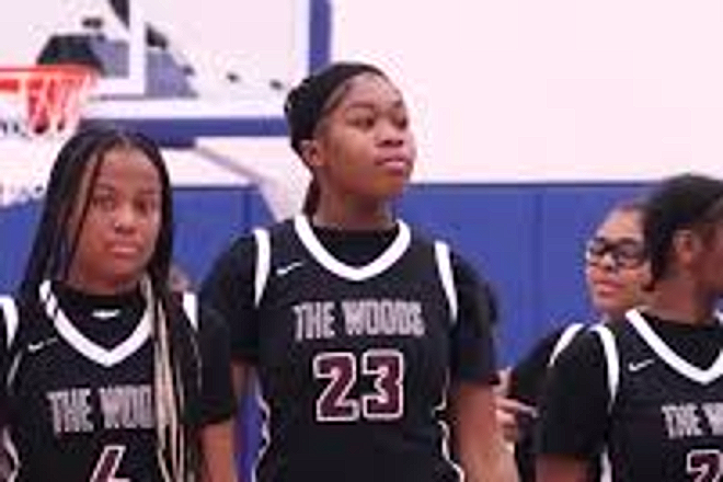 Harper Woods girls basketball players on the court