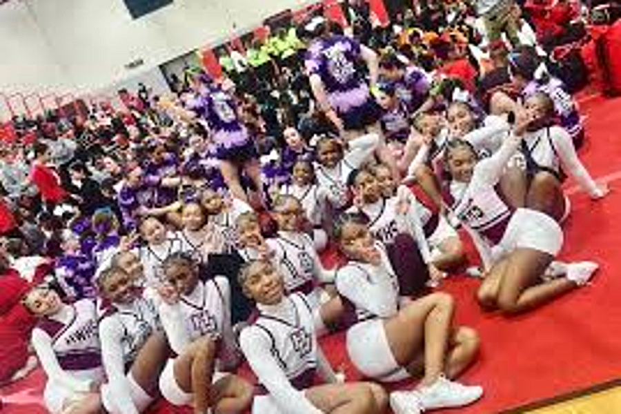 The Harper Woods competitive cheer team at a district competition