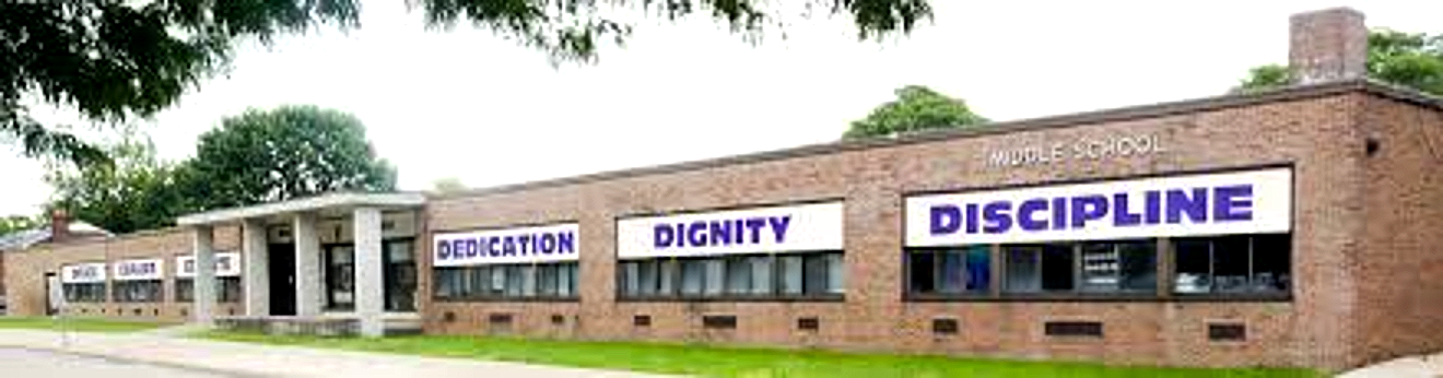 Harper Woods Middle School exterior with Dedication, Dignity, Discipline banners