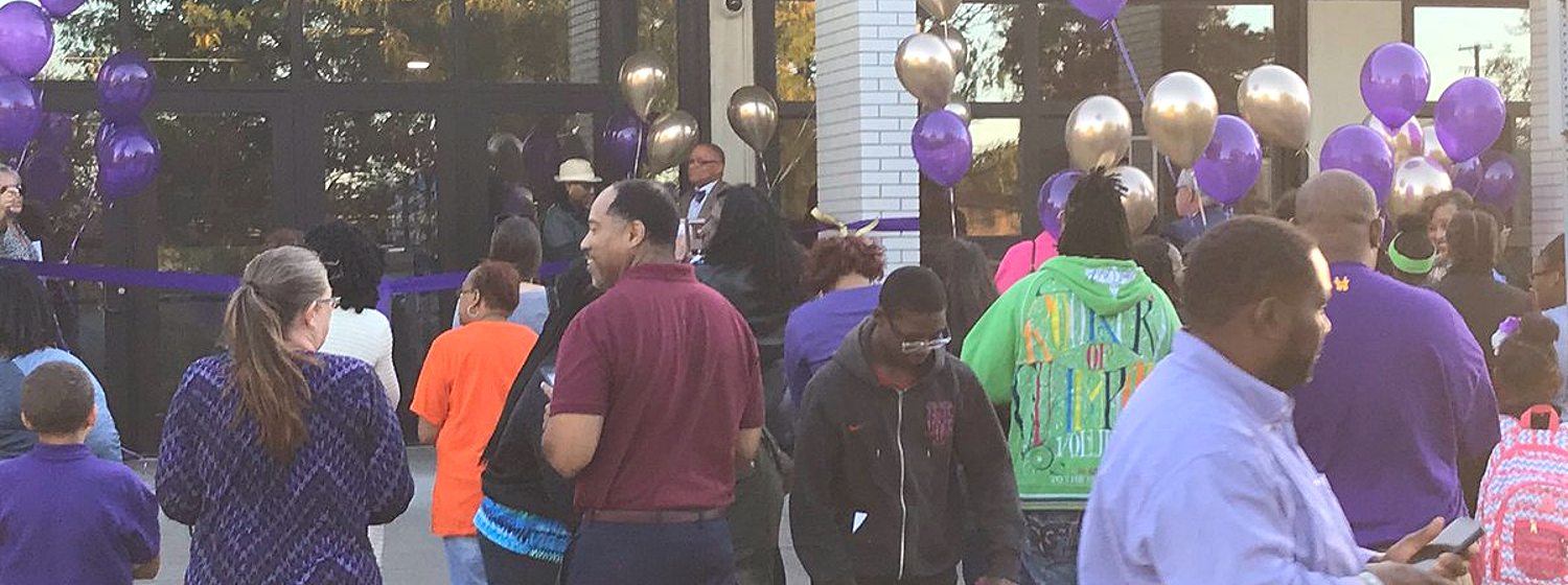 Harper Woods Middle School families arriving for a Welcome to Triumph event