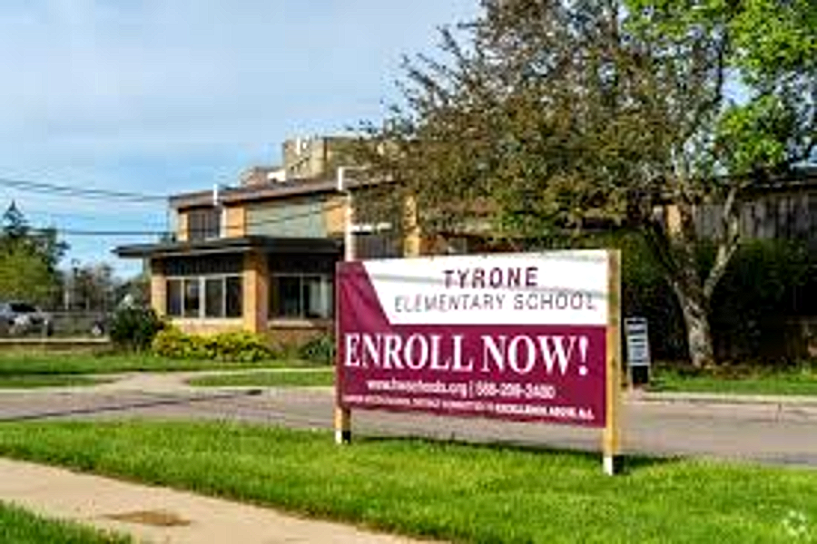 The Tyrone Elementary School Enroll Now sign on Beaconsfield